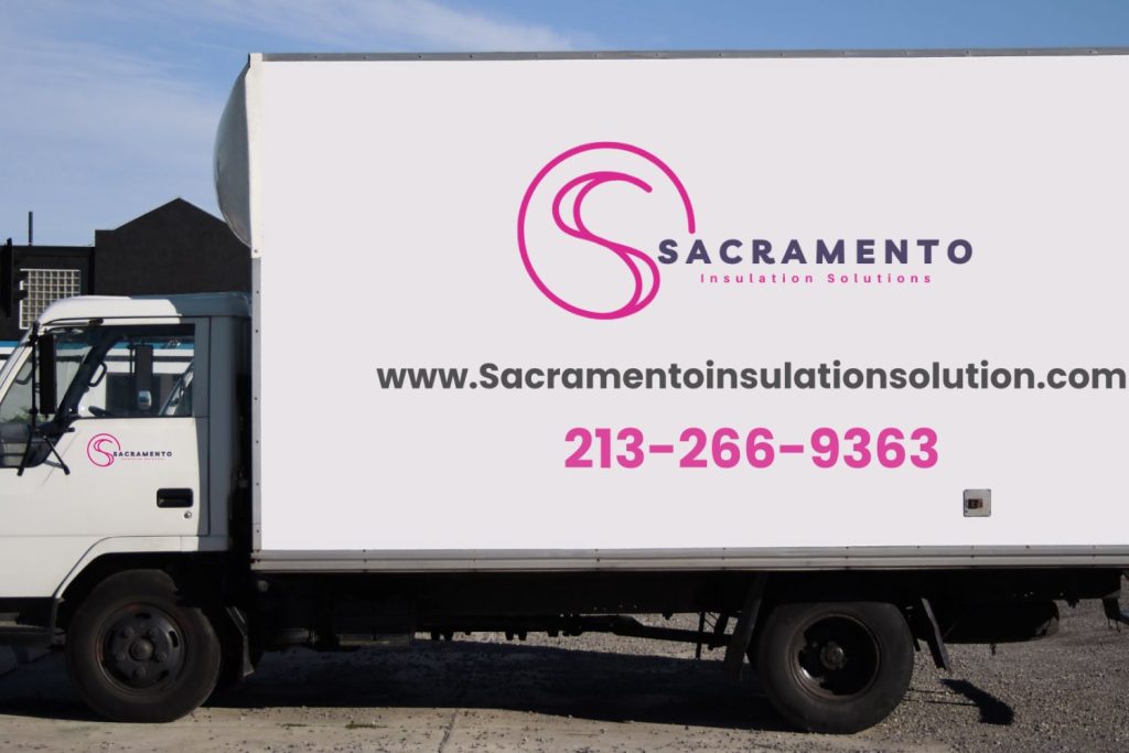 A delivery truck featuring the logo and contact information for Sacramento Insulation Solutions on its side.